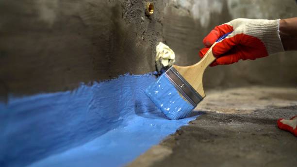 SJ Waterproofing Pros commercial waterproofing team near Cadillac, MI